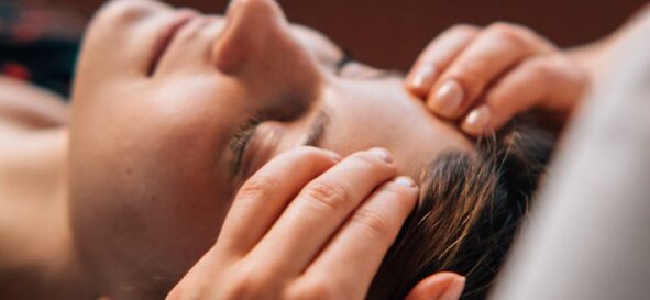 Photo by KoolShooters Close-up of a woman receiving a soothing massage at a spa for complete relaxation.
