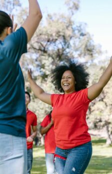 Photo by RDNE Stock project Diverse group of adults engaged in a lively outdoor team-building activity, fostering unity and enjoyment.